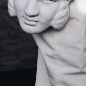 A statue of a man with a beard and mustache.