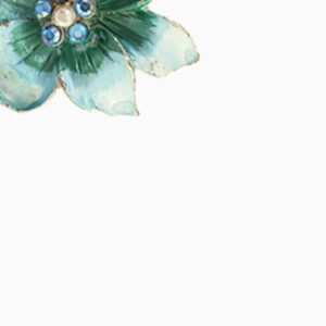 A green flower with blue centers on top of the page.