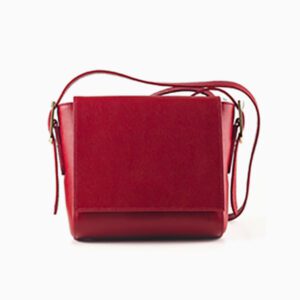 A red purse is shown with a strap.